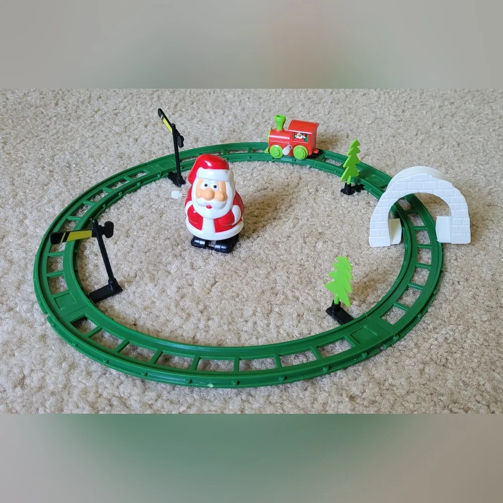 Wind-up plastic christmas Santa train set & walking Santa Claus-14 pcs.